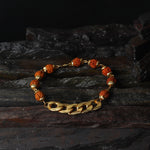 Close-up of Gold Plated Rudraksha Chain Bracelet, showcasing authentic Rudraksha beads and gold plating