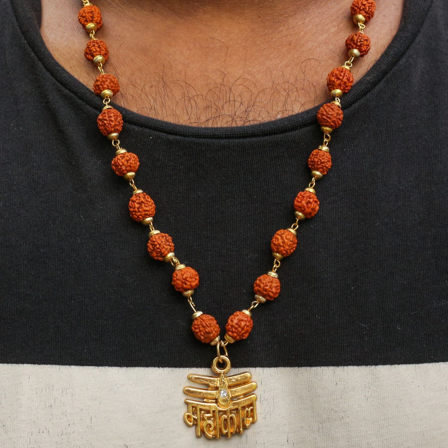 Close-up of the Gold Plated Rudraksha Mahakaal Necklace displaying the Rudraksha beads and Mahakaal pendant