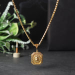 Shiny gold plated pendant with Suraj Mukhi design